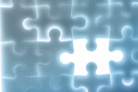 Background of large shining puzzles in blueの写真素材