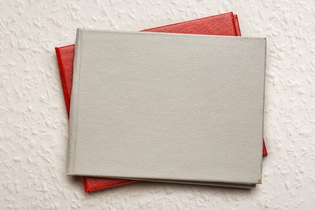 Two blank document covers closed in closeupの写真素材