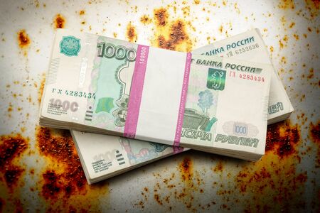 Pile of money in wrapper in closeupの写真素材