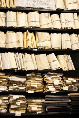 Paper documents stacked in folders as archiveの写真素材