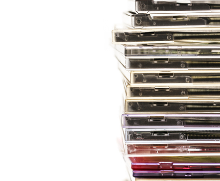 Pile of compact disks as background closeupの写真素材