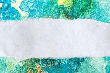 Ragged piece of paper on watercolor background