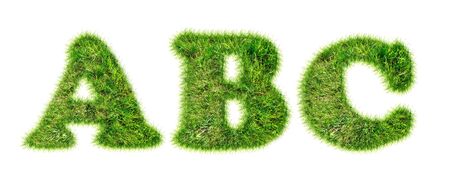 Latin alphabet letters made of green grassの写真素材