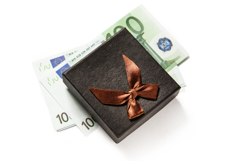 Gift box with one hundred euro banknotesの写真素材