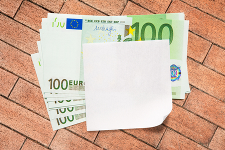 One hundred euro banknotes and blank paperの写真素材