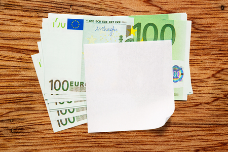 One hundred euro banknotes and blank paperの写真素材