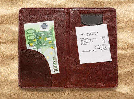 Open check folder with bill and euro banknotesの写真素材