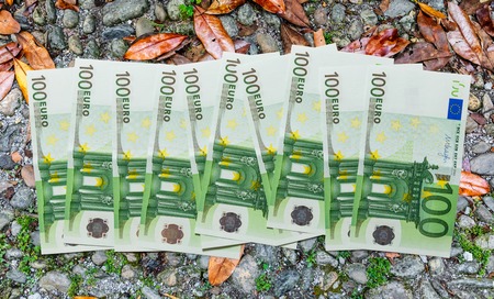 One hundred euro banknotes on stone backgroundの写真素材