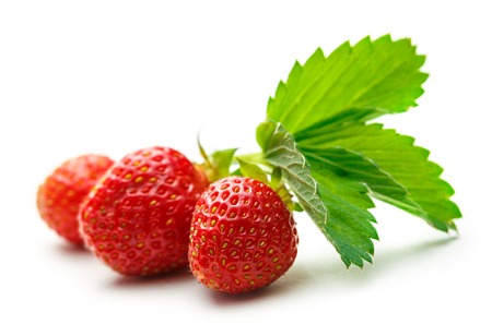 Fresh strawberry with leaves on white backgroundの写真素材
