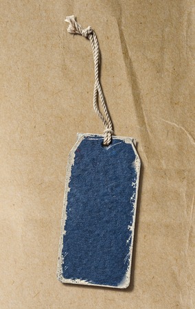 Blue blank paper label on paper backgroundの写真素材