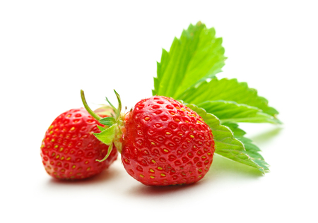 Fresh strawberry with leaves on white backgroundの写真素材