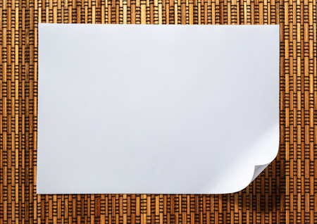 Blank sheet of paper as white backgroundの写真素材