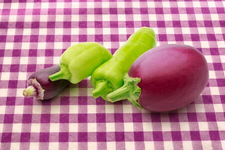 Paprika pepper and fresh eggplant in closeupの写真素材