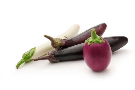 Fresh eggplants on the white background closeupの写真素材