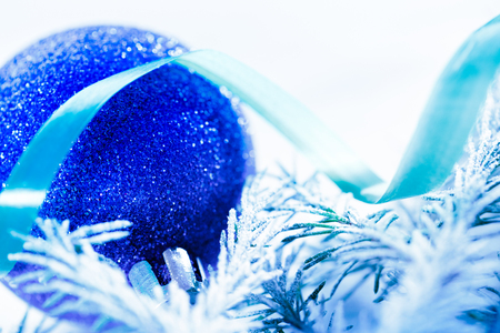 Christmas background with snow, toy and firtree branchの写真素材