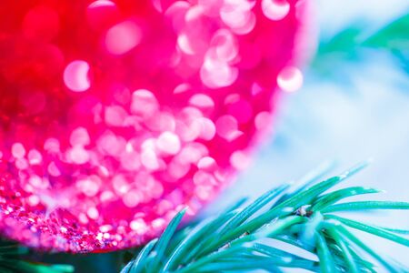Christmas background with evergreen branch and jingle bells