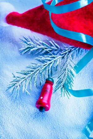 Christmas background with snow, toy and firtree branchの写真素材