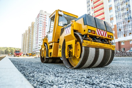 Road roller working at road construction siteの写真素材