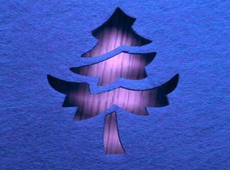 Christmas decorative tree silhouette of blue textileの写真素材