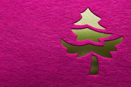 Christmas decorative tree silhouette of red textileの写真素材