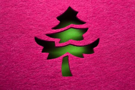 Christmas decorative tree silhouette of red textileの写真素材
