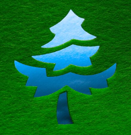 Christmas decorative tree silhouette of green textileの写真素材