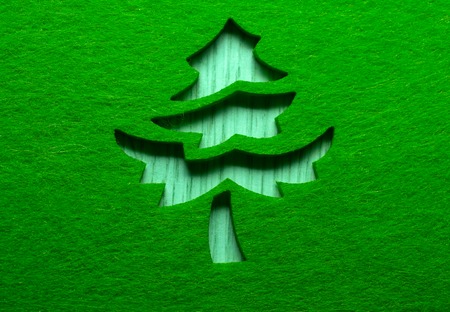 Christmas decorative tree silhouette of green textileの写真素材