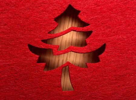 Christmas decorative tree silhouette of red textileの写真素材