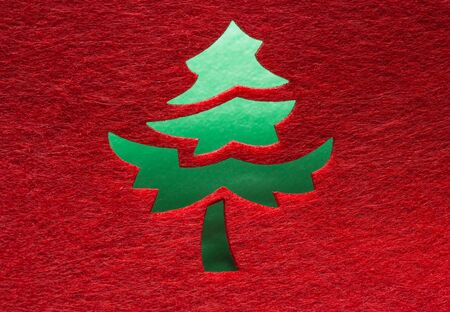 Christmas decorative tree silhouette of red textileの写真素材