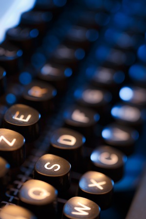 Keyboard of typewriter in blue toningの写真素材