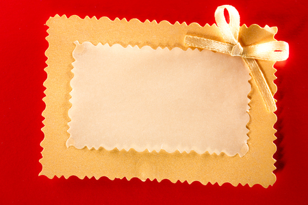 Blank greeting card with decorative bowの写真素材