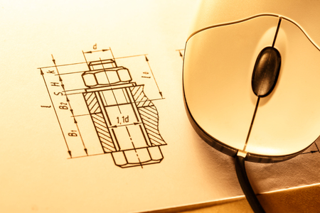 Drafting and computer mouse in toning closeupの写真素材