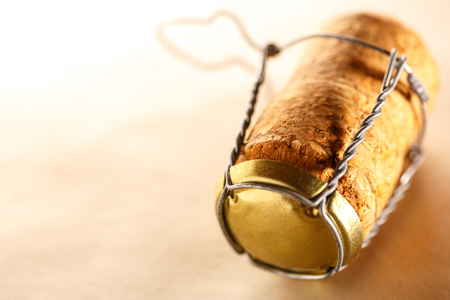 Champagne cork on paper background in closeupの写真素材
