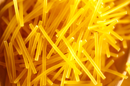 Short thin pasta tubes in closeupの写真素材