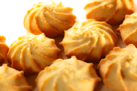 Fresh biscuits on the paper background closeupの写真素材
