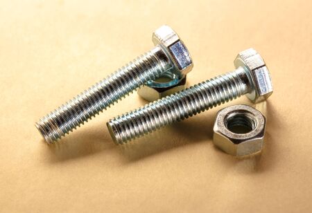 Screw bolts and nuts in closeup newの写真素材