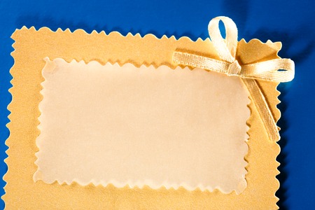 Blank greeting card with decorative bowの写真素材