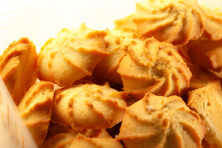 Fresh biscuits on the paper background closeupの写真素材