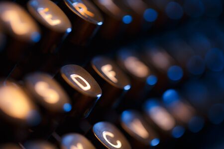 Keyboard of typewriter in blue toningの写真素材