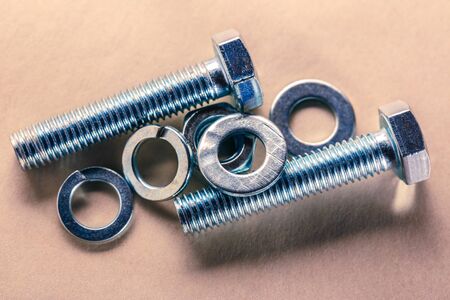 Screw bolts and nuts in closeup newの写真素材