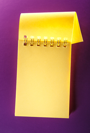 Blank open notebook on the lilac backgroundの写真素材