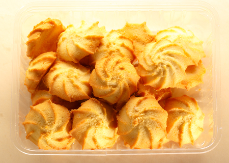 Fresh biscuits on the paper background closeupの写真素材