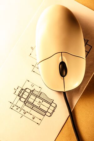 Drafting and computer mouse in toning closeupの写真素材