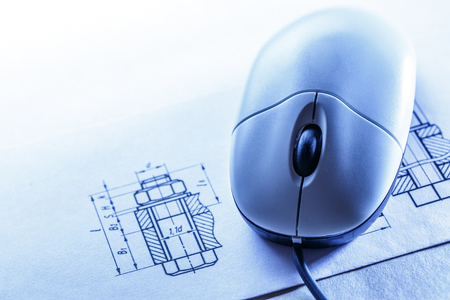 Drafting and computer mouse in toning closeupの写真素材