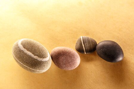 Set of sea stones on paper backgroundの写真素材