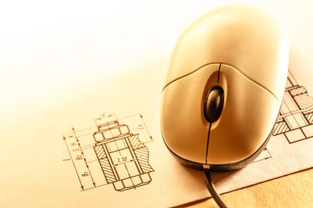 Drafting and computer mouse in toning closeupの写真素材