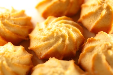 Fresh biscuits on the paper background closeupの写真素材