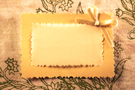 Blank greeting card with decorative bowの写真素材