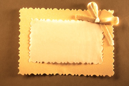 Blank greeting card with decorative bowの写真素材