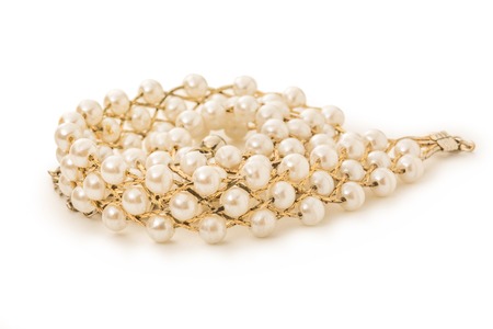 Necklace with golden chain and white beadsの写真素材
